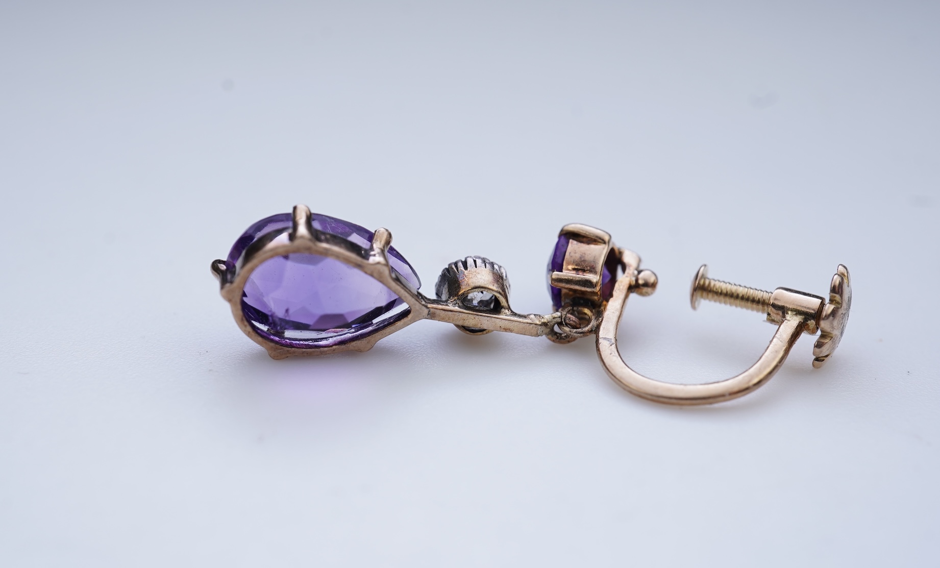 A pair of amethyst and diamond earrings, early 20th century